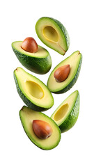 Dynamic arrangement of fresh green avocados cut in half, isolated on white