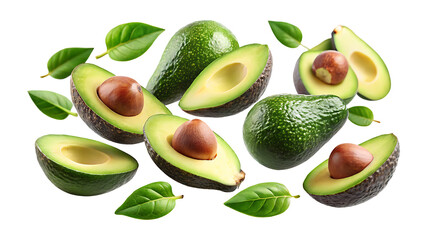Fresh avocados cut in half and whole with avocado leaves floating around