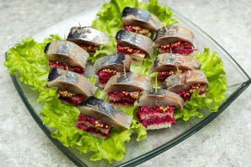 Scandinavian sandwiches with herring and beetroot
