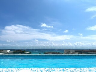 Infinity Pool Blending into Ocean Horizon