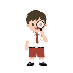 Indonesian elementary student bring  a magnifying glass