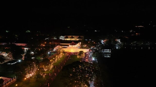 Aerial footage of the Kandy Esala Perahera, Sri Lanka&rsquo;s most iconic cultural festival. The drone captures the grand procession with traditional dancers, fire performers, drummers, and richly adorned e
