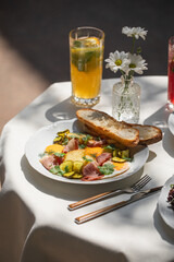 Gourmet portion of fried eggs and smoked meat breakfast