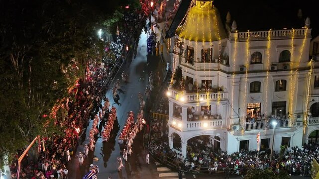 Aerial footage of the Kandy Esala Perahera, Sri Lanka&rsquo;s most iconic cultural festival. The drone captures the grand procession with traditional dancers, fire performers, drummers, and richly adorned e