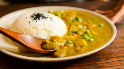 Chicken curry is a popular dish that is loved by many for its deliciousness, made from chicken pieces cooked in a thick, spiced sauce.