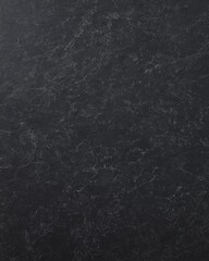 Honed black soapstone surface with delicate natural marbling