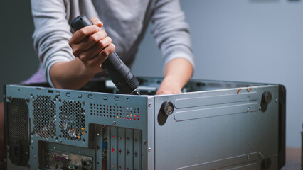 Computer repair action home workshop instructional content indoor setting close-up view diy concept