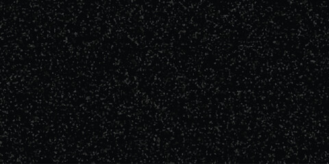 Dark textured surface featuring a mosaic of tiny, varied shapes creating a granite like surface, perfect for various design needs and applications