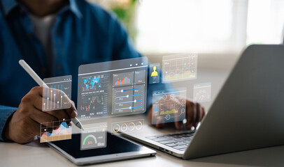 Businessman working modern computer virtual dashboard forex trading graph financial data. Stock...
