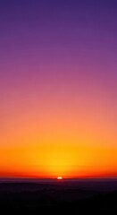 Naklejka na ściany i meble Vibrant sunset horizon with purple and orange gradient sky