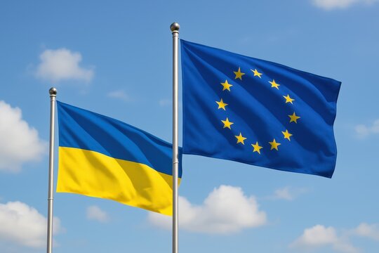 Ukrainian and European Union flags flying side by side against a partly cloudy blue sky, symbolizing unity, support, and diplomacy.