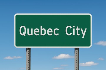 Green road sign displaying "Quebec City" with a clear blue sky background, indicating travel direction or city location in Canada.