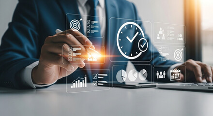 Businessman interacting with virtual interface displaying data charts and time management icons