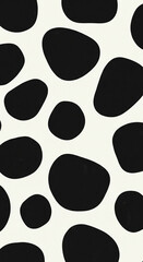 Modern black and white cow print pattern on fabric or wallpaper