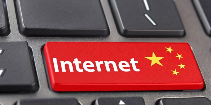 Red Internet Key with Chinese Flag on Modern Computer Keyboard