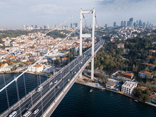 Suspension bridge above Bosphorus and highway leading to downtown with skyscrapers, Istanbul, Turkey