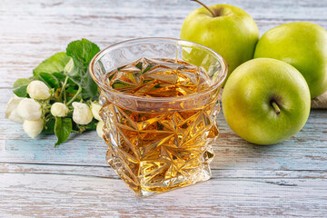 Apple yellow juice in the glass