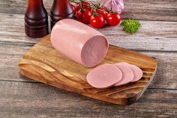 Boiled sausage with slices for breakfast