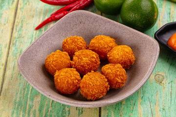 Fried crispy yellow cheese balls