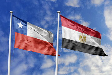 Flags of Chile and Egypt Waving Against a Clear Blue Sky, Symbolizing Diplomatic Relations and...