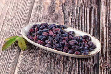 Sweet juicy ripe honeysuckle berries