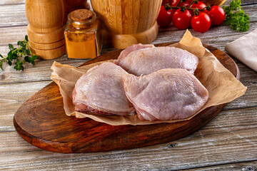 Raw chicken thighs for cooking