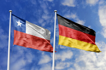 Flags of Chile and Germany Waving Against a Bright Blue Sky, Symbolizing Strong Bilateral Relations and Global Partnership
