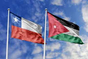 Flags of Chile and Jordan waving side by side against a vibrant blue sky, symbolizing international relations, diplomacy, and cooperation between the two nations.
