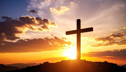 A wooden cross stands prominently on a hilltop against a vibrant sunset sky with clouds, symbolizing faith and hope.