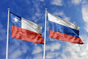 Chile and Russia flags waving under a bright sky, symbolizing unity and ties. Red, white star of...