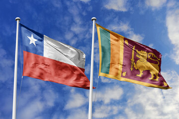 Chile and Sri Lanka flags waving under a bright sky, symbolizing unity and cultural ties. Red,...