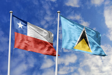 The Flags of Chile and Saint Lucia Waving Together, Symbolizing Diplomatic Ties Between Distinct Nations.