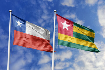 The Flags of Chile and Togo Waving Together, Symbolizing International Relations and Global Diversity.