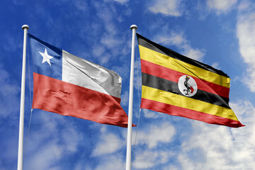 The Flags of Chile and Uganda Waving Side by Side, Symbolizing International Diplomacy and Cultural Exchange.