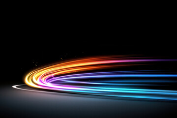 Colorful fiber optic light trails curve on dark background, abstract motion and energy concept, vibrant and dynamic