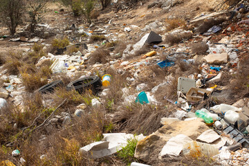 Littered landscape in Spain depicting environmental concerns and issues of tourism management