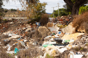 Impressive views marred by litter in a scenic area of Spain featuring natural landscapes and urban...