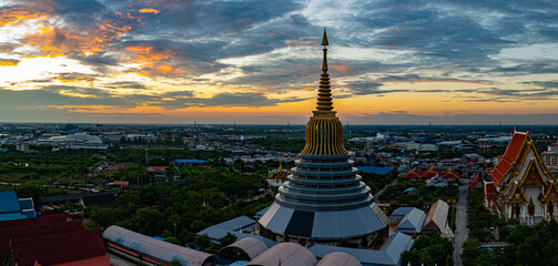 An aerial Wat Ketmadi Sriwararam perspective showcasing a stunning Thai temple complex with...