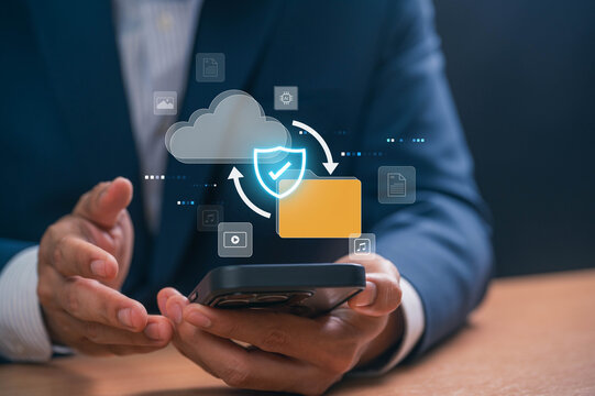 Cloud storage and data protection concept with businessman using smartphone to upload and access encrypted digital files via secure mobile app for business data management and privacy protection - Powered by Adobe