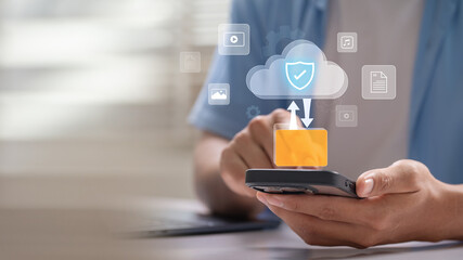 Cloud technology mobile data security with user accessing encrypted files through smartphone to upload and download digital content using secure cloud storage solution for remote work and connectivity