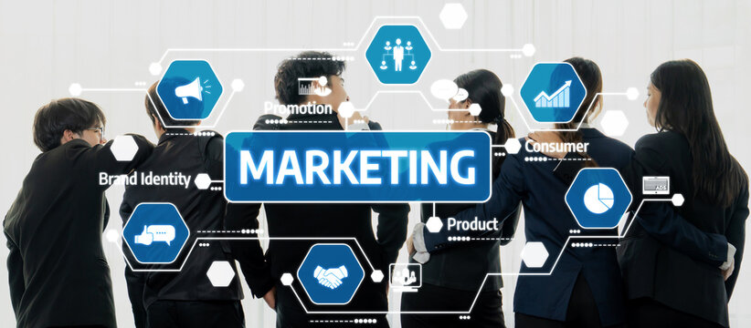 A diverse team of professionals work together to enhance marketing strategies using technology. They explore brand identity, consumer engagement, and promotional techniques effectively. Amity