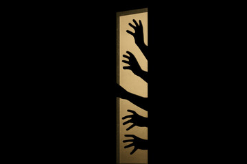 Hands reaching out on a black and gold poster.