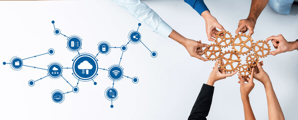 Hands uniting around a network of cloud computing icons symbolize teamwork and innovation in...