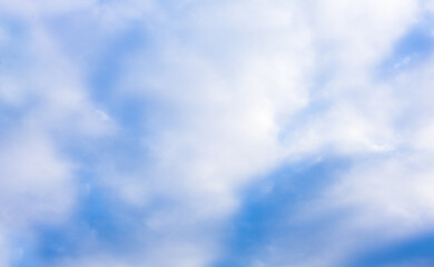 Beautiful blue sky and white fluffy group of clouds background in the morning skyline