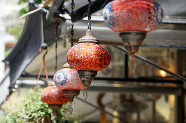 Colorful mosaic lamps glow in Grand Bazaar
