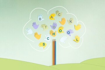 Back to school, colorful pencils and children hands building a tree, education and skill learning,...