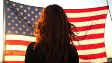 Woman standing in front of american flag patriotic usa pride independence day memorial day labor day - Powered by Adobe