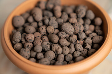 Clay Pebbles in Terracotta Pot for Hydroponics, Organic Gardening, Drainage and Soil Aeration, Lightweight Expanded Clay Aggregate, LECA for Houseplants and Sustainable Indoor Plant Care