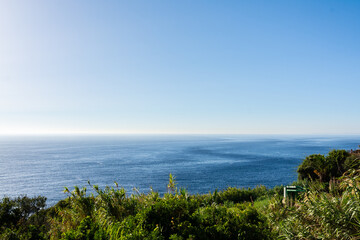 Scenic views of Tangier's seafront and old medina walls on a sunny day, showing a mix of coastal charm, public spaces, and historic Moroccan architecture