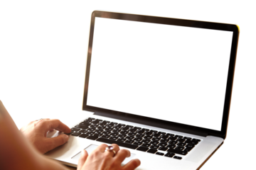 Rear view of high school girl using laptop for doing homework, browsing Internet, searching for required information, sitting at desk with mobile phone with copy space screen lying next to her